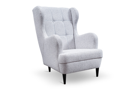 Klasyczny pikowany fotel uszak Snug smukłe drewniane nóżki